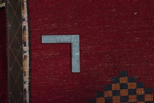 Close-up detail of 2000s Persian Gabbeh rug from Iran / Persia showing Wool weave