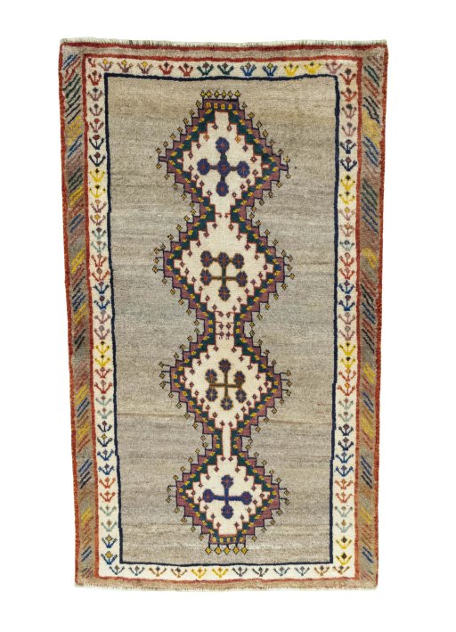 Full view of 2000s Persian Gabbeh rug from Iran / Persia, 174 × 100 cm in Beige tones