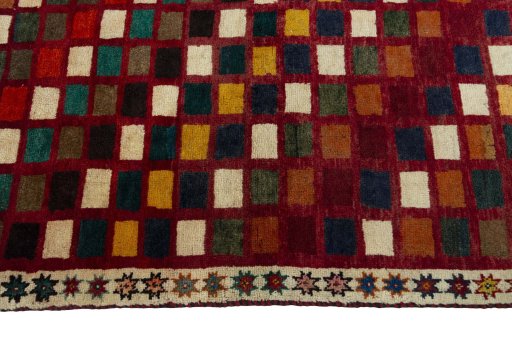 Close-up detail of 2000s Persian Gabbeh rug from Iran / Persia showing Wool weave