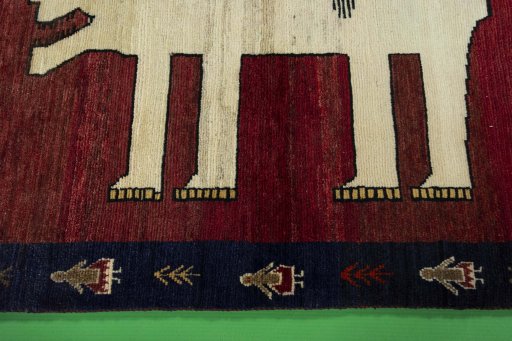 Close-up detail of 2000s Persian Gabbeh rug from Iran / Persia showing Wool weave