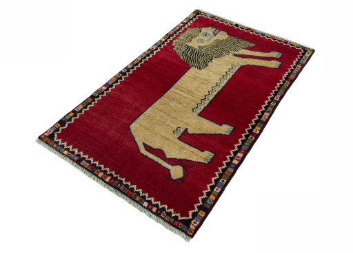 Corner detail of 2000s Persian Gabbeh rug showing border pattern and Wool pile