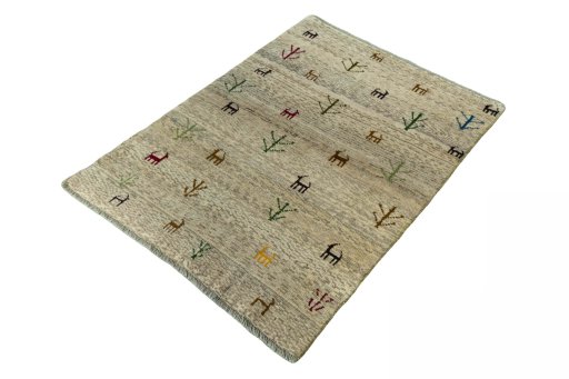 Corner detail of 2000s Persian Gabbeh rug showing border pattern and Wool pile
