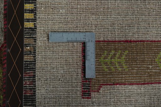 Close-up detail of 2000s Persian Gabbeh rug from Iran / Persia showing Wool weave