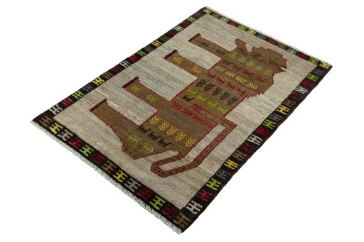 Corner detail of 2000s Persian Gabbeh rug showing border pattern and Wool pile