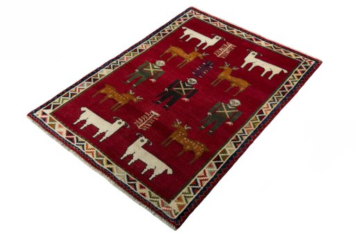 Corner detail of 2000s Persian Gabbeh rug showing border pattern and Wool pile