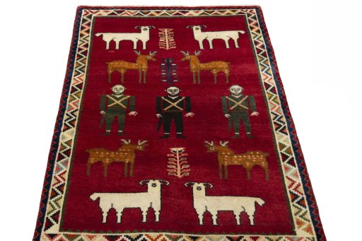 Surface texture of 2000s Persian Gabbeh rug with natural Wool and intricate pattern