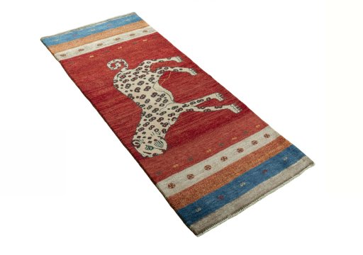 Close-up detail of 2000s Persian Gabbeh rug from Iran / Persia showing Wool weave