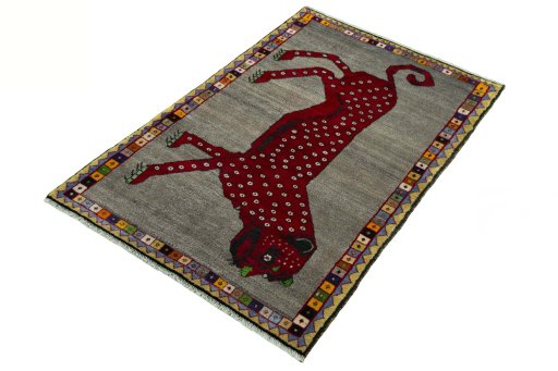 Corner detail of 2000s Persian Gabbeh rug showing border pattern and Wool pile