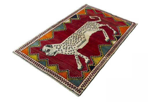 Corner detail of 2000s Persian Gabbeh rug showing border pattern and Wool pile