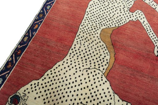 Backside of handmade 2000s Persian Gabbeh rug showing knot structure and weave density