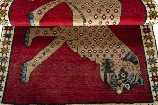 Full view of 2000s Persian Gabbeh rug from Iran / Persia, 167 × 104 cm in Red tones