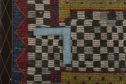 Close-up detail of 2000s Persian Gabbeh rug from Iran / Persia showing Wool weave