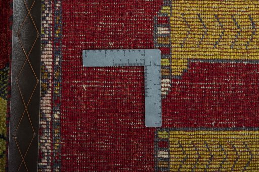 Close-up detail of 2000s Persian Gabbeh rug from Iran / Persia showing Wool weave