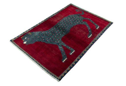 Corner detail of 2000s Persian Gabbeh rug showing border pattern and Wool pile