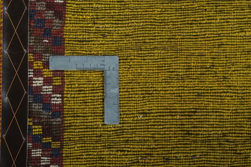 Close-up detail of 2000s Persian Gabbeh rug from Iran / Persia showing Wool weave