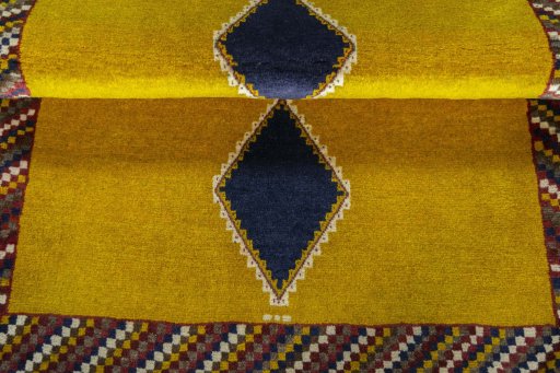 Full view of 2000s Persian Gabbeh rug from Iran / Persia, 140 × 106 cm in Yellow tones