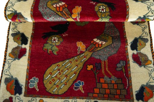 Full view of 2000s Persian Gabbeh rug from Iran / Persia, 158 × 92 cm in Red tones