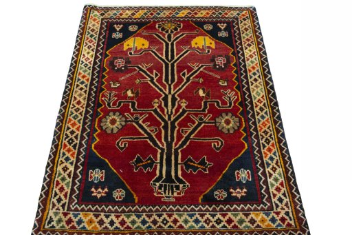 Surface texture of 2000s Persian Gabbeh rug with natural Wool and intricate pattern