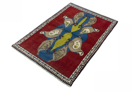 Corner detail of 2000s Persian Gabbeh rug showing border pattern and Wool pile