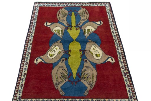 Surface texture of 2000s Persian Gabbeh rug with natural Wool and intricate pattern