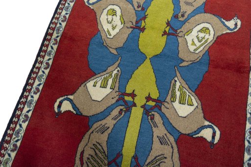 Backside of handmade 2000s Persian Gabbeh rug showing knot structure and weave density