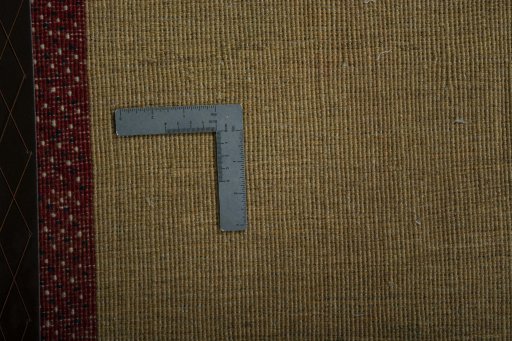 Corner detail of New Persian Gabbeh rug showing border pattern and Wool pile