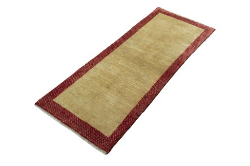 Corner detail of New Persian Gabbeh rug showing border pattern and Wool pile