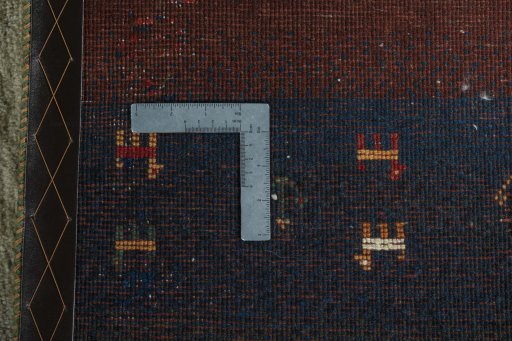 Close-up detail of 2000s Persian Gabbeh rug from Iran / Persia showing Wool weave