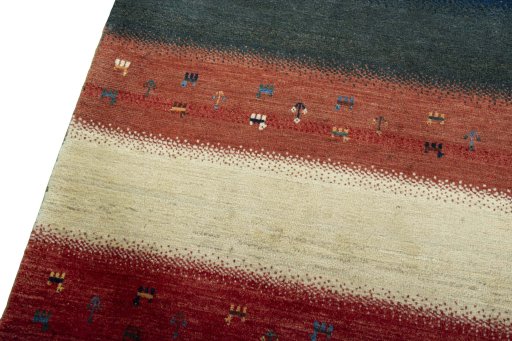 Backside of handmade 2000s Persian Gabbeh rug showing knot structure and weave density