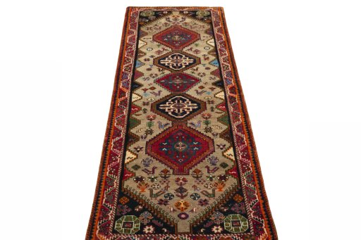 Surface texture of 2000s Persian Gabbeh rug with natural Wool and intricate pattern