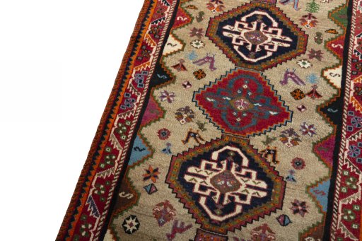 Backside of handmade 2000s Persian Gabbeh rug showing knot structure and weave density
