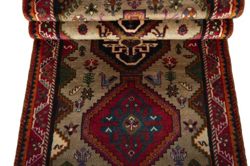 Full view of 2000s Persian Gabbeh rug from Iran / Persia, 243 × 84 cm in Beige tones