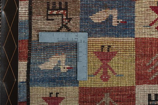Close-up detail of 2000s Persian Gabbeh rug from Iran / Persia showing Wool weave