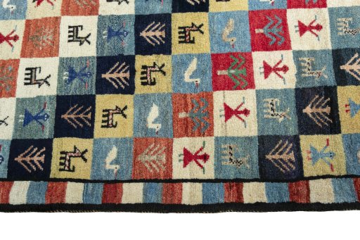 Close-up detail of 2000s Persian Gabbeh rug from Iran / Persia showing Wool weave