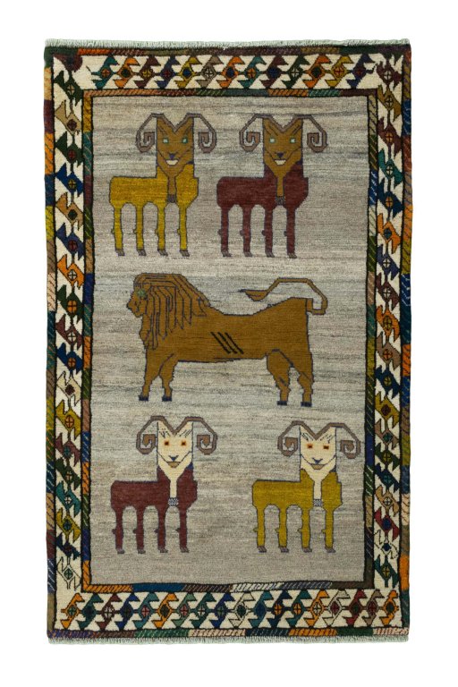 Full view of 2000s Persian Gabbeh rug from Iran / Persia, 171 × 105 cm in Beige tones