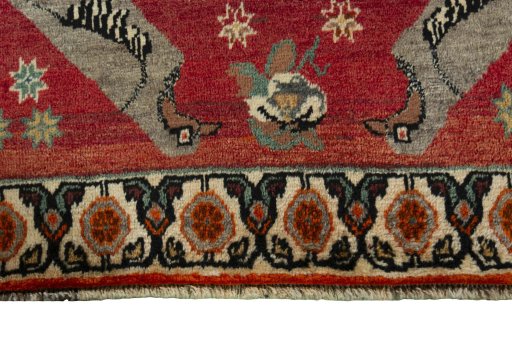 Central medallion detail of 2000s Persian Gabbeh rug from Iran / Persia