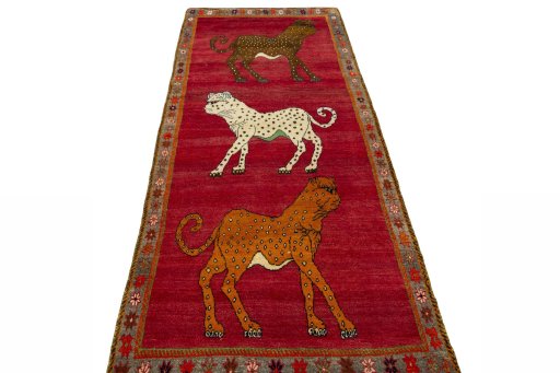 Surface texture of 2000s Persian Gabbeh rug with natural Wool and intricate pattern