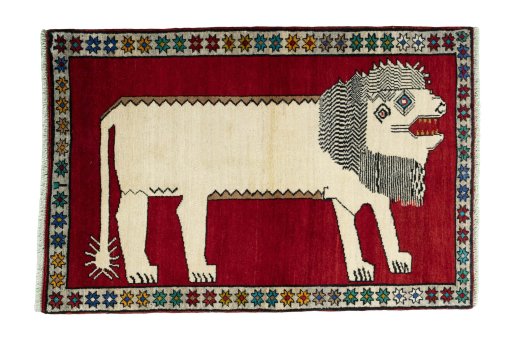 Full view of 2000s Persian Gabbeh rug from Iran / Persia, 150 × 101 cm in Red tones