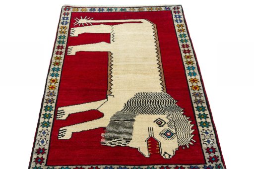 Surface texture of 2000s Persian Gabbeh rug with natural Wool and intricate pattern
