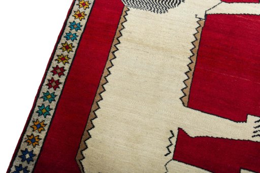 Backside of handmade 2000s Persian Gabbeh rug showing knot structure and weave density