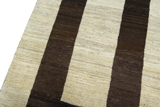 Backside of handmade 2000s Persian Gabbeh rug showing knot structure and weave density
