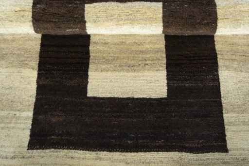 Full view of 2000s Persian Gabbeh rug from Iran / Persia, 150 × 102 cm in Beige tones