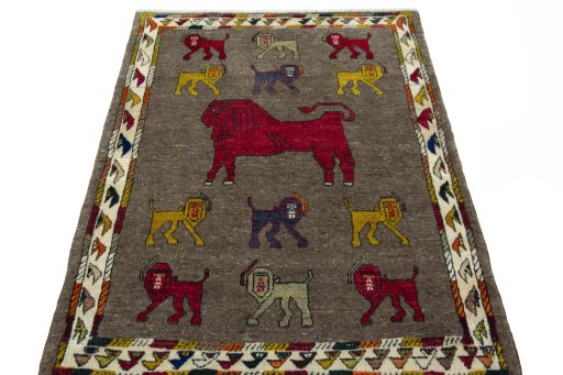 Surface texture of 2000s Persian Gabbeh rug with natural Wool and intricate pattern