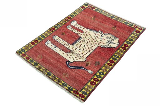 Corner detail of 2000s Persian Gabbeh rug showing border pattern and Wool pile