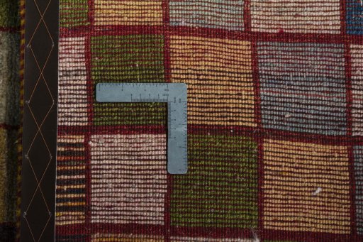 Close-up detail of 2000s Persian Gabbeh rug from Iran / Persia showing Wool weave