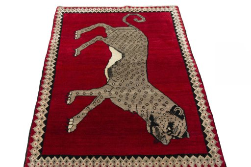 Surface texture of 2000s Persian Gabbeh rug with natural Wool and intricate pattern