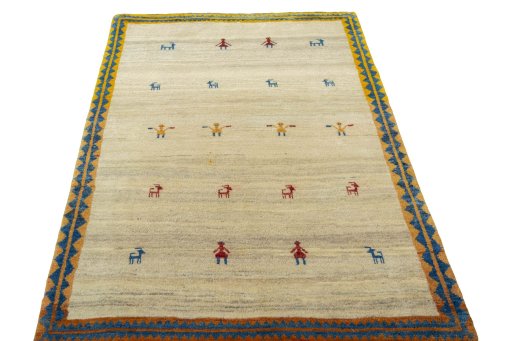Surface texture of 2000s Persian Gabbeh rug with natural Wool and intricate pattern