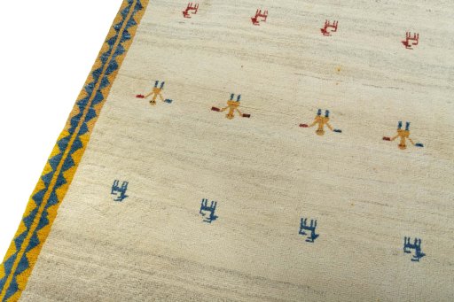 Backside of handmade 2000s Persian Gabbeh rug showing knot structure and weave density