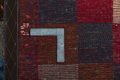 Close-up detail of 2000s Persian Gabbeh rug from Iran / Persia showing Wool weave