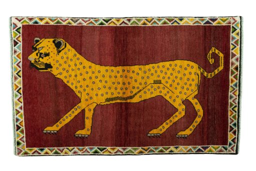 Full view of 2000s Persian Gabbeh rug from Iran / Persia, 178 × 107 cm in Red tones